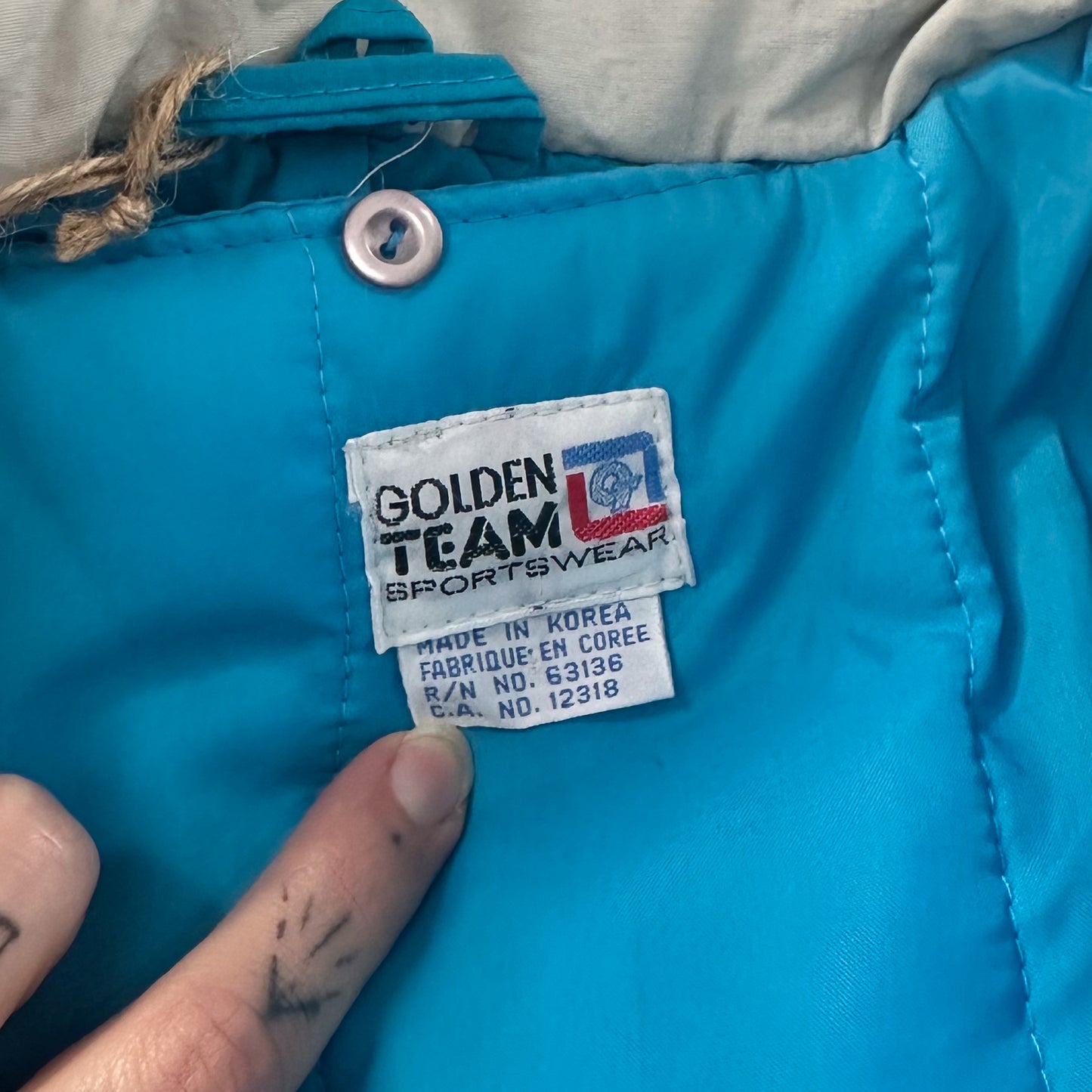 vintage 1970s turquoise snow suit
