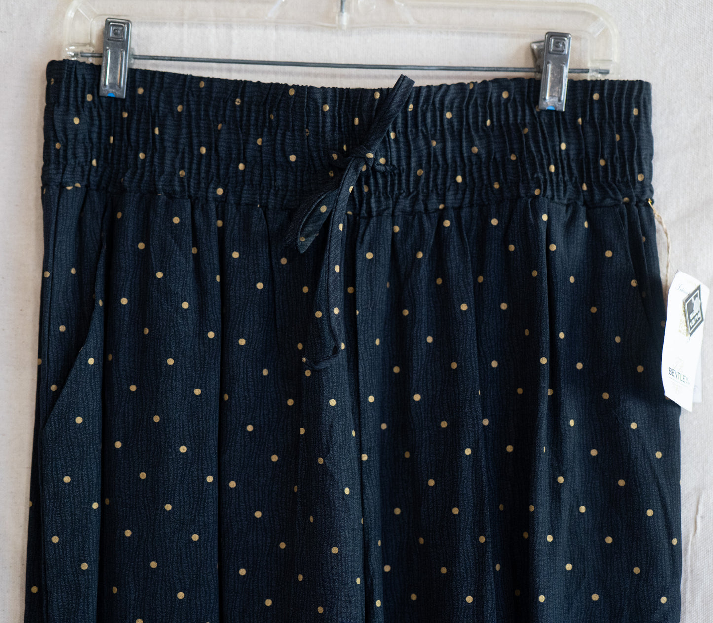 vintage 80s deadstock black & gold polka dot wide leg pants