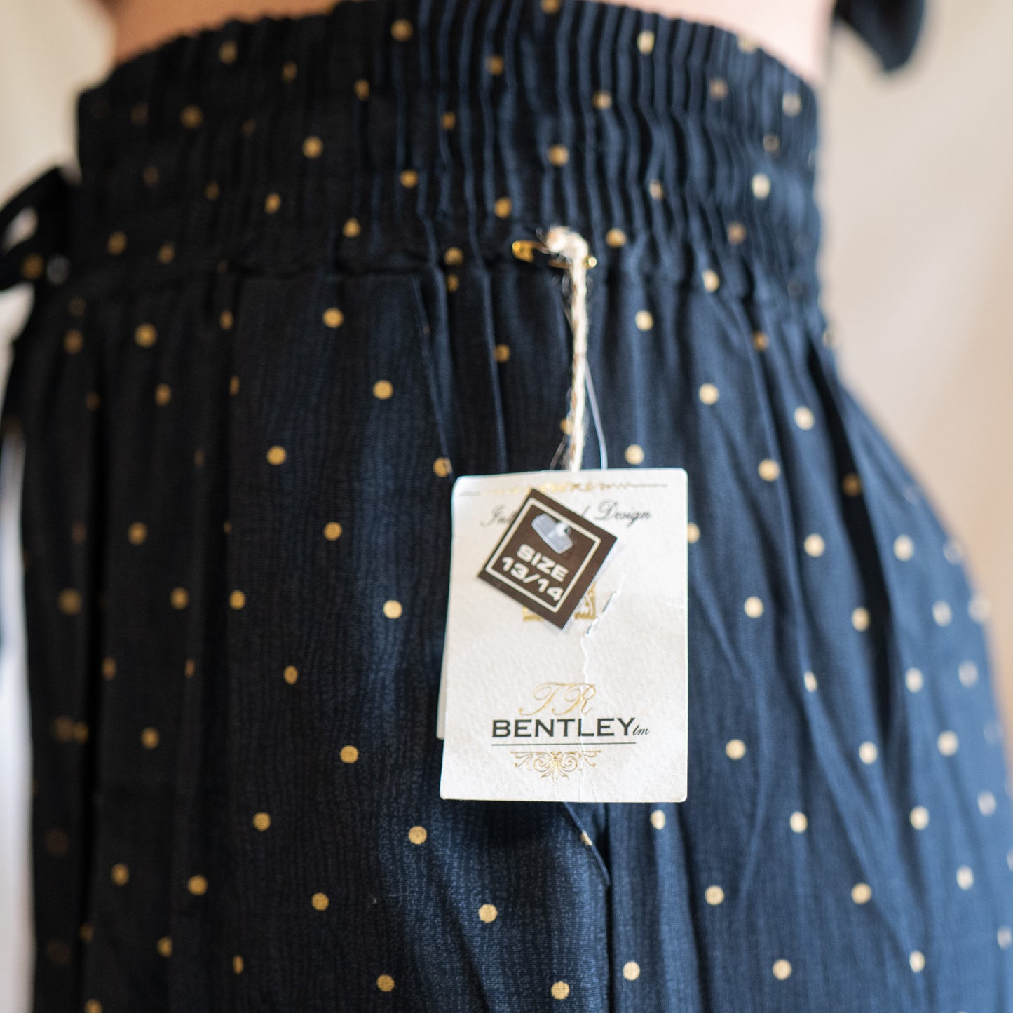 vintage 80s deadstock black & gold polka dot wide leg pants